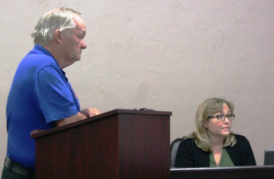 Bronson Fire Chief Dennis Russell and Town Clerk Shirley Miller listen to discussion on planned firehouse.