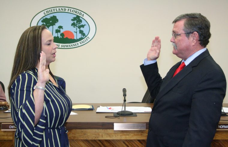 Lewrissa Mainwaring takes the oath of office from County Judge James T. Browning.