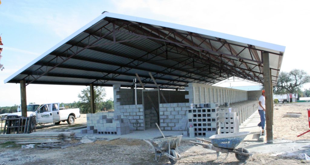 This is a look at the new dog shelter from the front. It has a metal roof and a steel frame. The county work crew erected the frame and roof. Jones Masonry is handling the concrete work. County work crews will install the electrical wiring, air conditioning and heating.