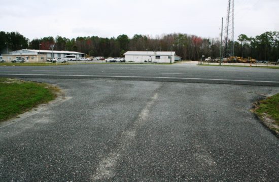 Bronson was given permission Tuesday by the Levy County Commission and Florida Department of Transportation to use this driveway at the Agriculture Extension Center for the new fire house. The Levy County Road Department can be seen on the opposite side of U.S. 27A. Photo by Terry Witt.