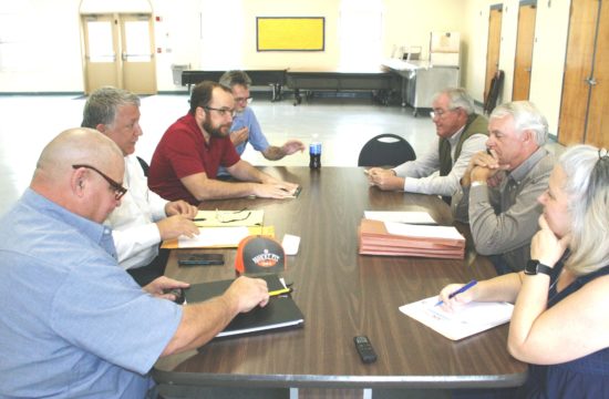 Laborers International bargaining team members on the left, Jimmy Willis, Business Agent Ronnie Burris, Attorney Andrew Bonderud and Bruce Haley meet with County Coordinator Wilbur Dean, County Labor Attorney Wayne Helsby and Human Resources Director Jacqueline Martin.