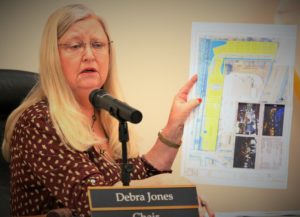 Williston Planning and Zoning Commission Chairwoman Debra Jones holds a preliminary site plan showing how Laurel Point would be developed.