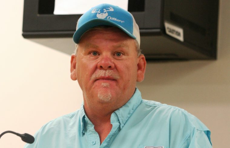 Levy County Animal Services Director David Weatherford stares at a photographer as he explains to commissioners problems connected to a spay and neutering grant. File Photo.