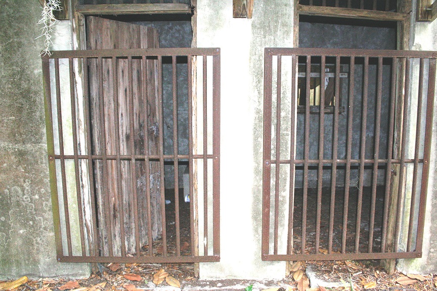 A close-up look at the two jail cells shows spartan living condition for those housed there.