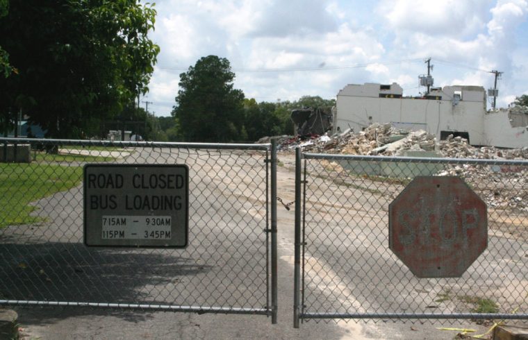 The school district plans to continue using the traditional bus loading and unloading site off 1st Ave. until the high school stadium is ready for school bus traffic.