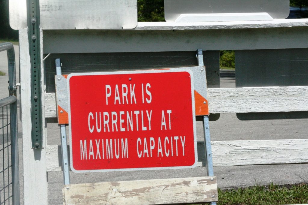 This sign, indicating when the park is at capacity, wasn't in use Thursday when the photo was taken. The parking lot wasn't full and people in the park were enjoying a warm summer day.