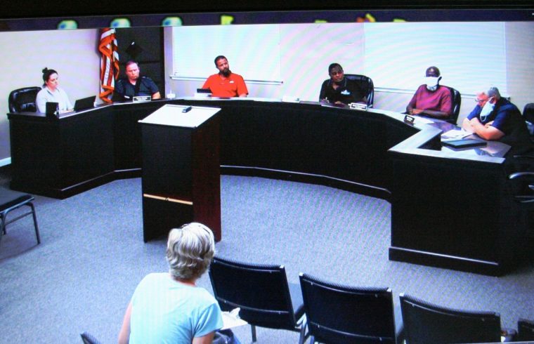 Bronson Town Council members gather to discuss whether Councilman Berlon Weeks should be removed from office. Pictured from the left at the council dais are Interim Town Clerk Melisa Thompson, Weeks, Councilman Jason Hunt, Mayor Beatrice Roberts, Councilman Aaron Edmondson and Councilman Robert Partin. The only person pictured in the audience is Levy County Democratic Executive Committee State Committee Woman and Precinct 2 Co- Chairperson Stacey Peters. Williston City Planner Jackie Gorman, former Mayor Franklin Schuler, and Levy County Democratic Executive Committee Precinct 1 Chairperson Deborah Goad arrived a few minutes later. No local news media covered the meeting.