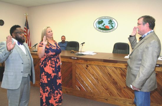 County Judge James T. Browning swears Lance Hayes and Lewrissa Mainwaring in as Chiefland city commissioners.