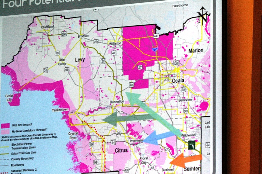 This state map shows areas in Levy, Marion, Citrus, and Sumter counties off limits to toll road construction in dark pink, or magenta, while light pink indicates no new corridors through those areas. It's a busy map. Kinda pretty in its own way, or not, depending on your tastes. The map encompasses the Northern Turnpike Corridor Task Force study area.