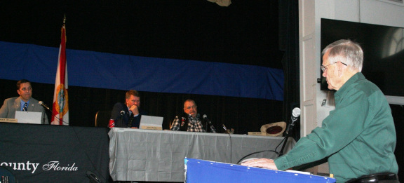 Sheriff Bobby McCallum tells Levy County Commissioners about the second hacker attack on his non-emergency phones. Commissioners in the photo are Chairman Matt Brooks and Commissioners John Meeks and Mike Joyner.