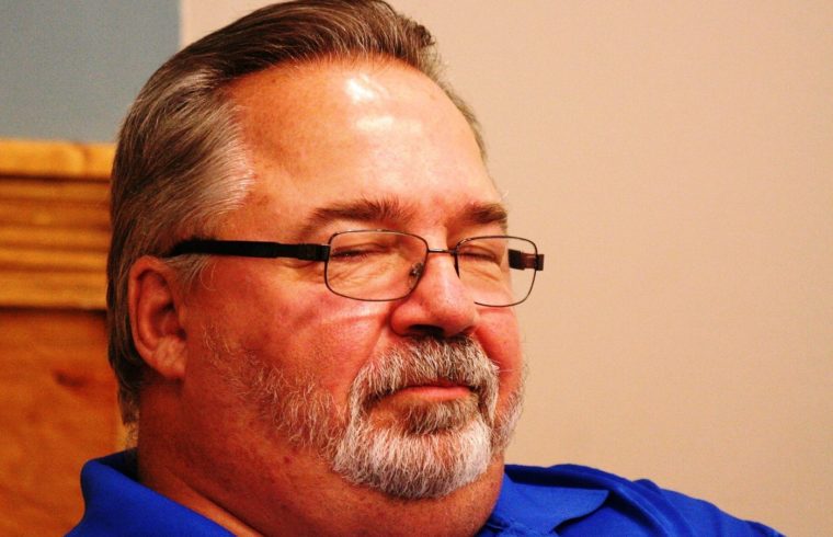 Businessman Michael Cox is Williston's newest council member. He is pictured at Tuesday's board meeting as an audience member.