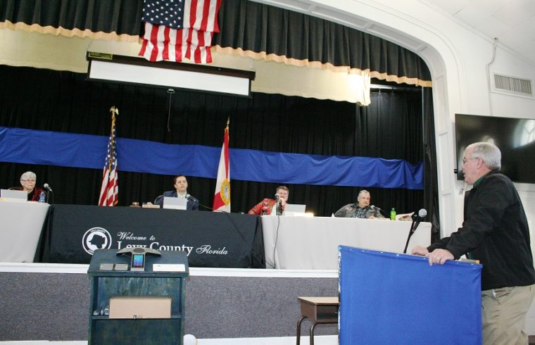 County Coordinator Wilbur Dean tells Commissioner Lilly Rooks, Commission Chairman Matt Brooks, Commissioner John Meeks, and Commissioner Mike Joyner he is crafting a policy that describes an unwritten pay raise practice that has gone on for years. Not pictured is Commissioner Rock Meeks, John Meeks was chosen as chairman and Joyner as vice-chairman in the meeting. Meeks voted against his appointment to the chairmanship.