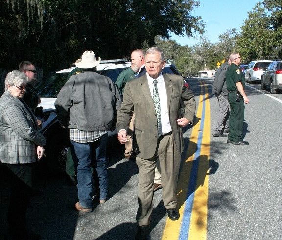 Sheriff Bobby McCallum walks along the thin blue line on Court Street Tuesday after a ceremony honoring law enforcement.