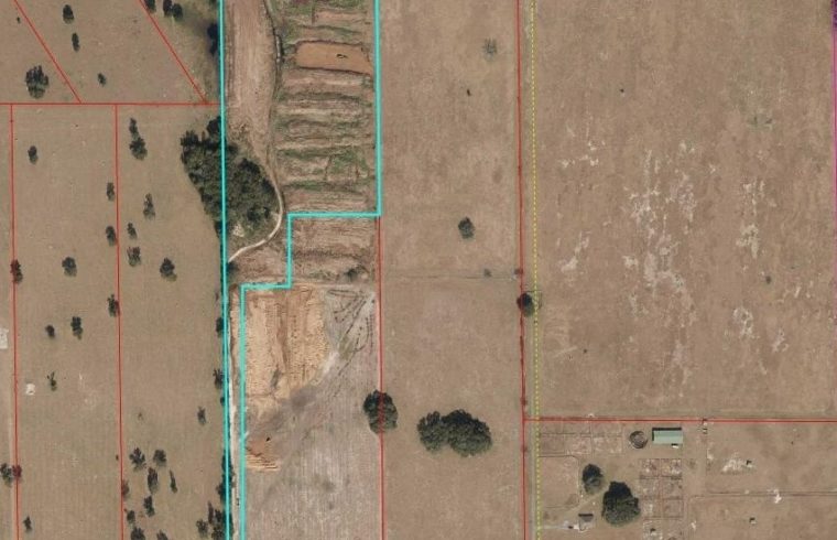 This Google Earth photograph of Allen Fant operation in Morriston shows a row of manure piles. County Commissioners Matt Brooks and Mike Joyner say they don't want this type of manure dumping site to be commonplace in Levy County.