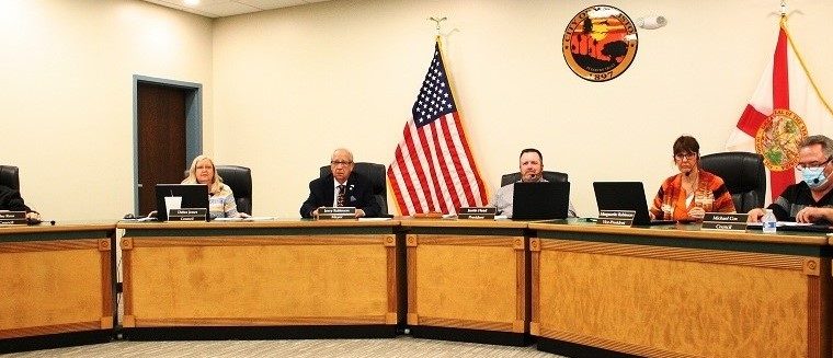 Williston City Council members prepare themselves for a recent board meeting. Pictured are Elihu Ross, Debra Jones, Mayor Jerry Robinson, Council President Justin Head, Marguerite Robinson and Michael Cox. Head did not seek re-election.