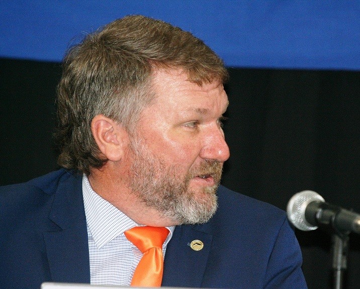 Commissioner John Meeks speaks during Tuesday's board meeting. He requested a former letter from the Bronson Town Council indicating its interest in buying the old Bronson High School gym.