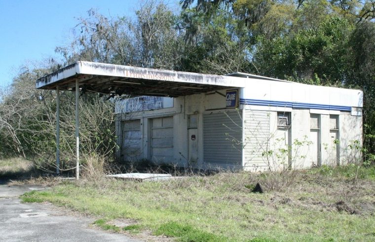 Williston is assessing its projected costs associated with cleanup of this abandoned gas station before going forward with foreclosure.