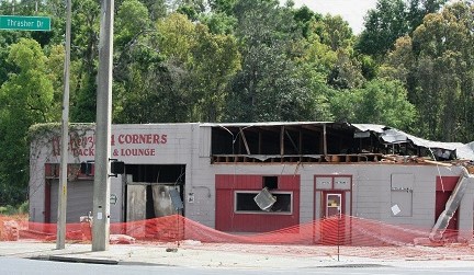 The remaining walls of McKenzie's 4 Corners Bar stood briefly before work crews demolished it for a new development.