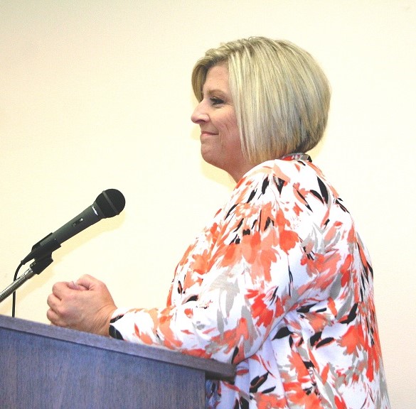 Interim City Manager Laura Cain was hired as city manager on a unanimous city commission vote Monday.