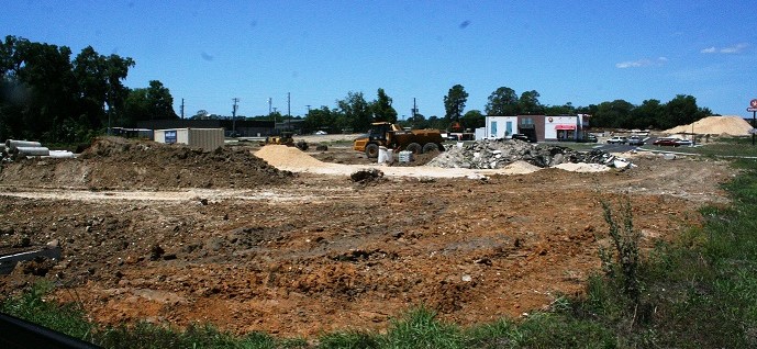 The new shopping center in Williston located at the site of the former Williston High School will be named by the community. Suggestions are being made on Spotlight. Suggestions can also be submitted at City Hall. Readers will note that Tractor Supply will build at the top of the hill. The company has erected a sign at the future store site. Deadline for submission is May 24.