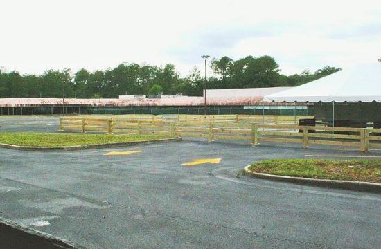 A large portion of the old Winn Dixie parking lot off State Road 121 in Williston has been resurfaced. Trees have been trimmed. The tent at the right is for visitors to meet company officials this weekend and ask questions about the future attraction planned for the site. The company is planning to revamp the property.