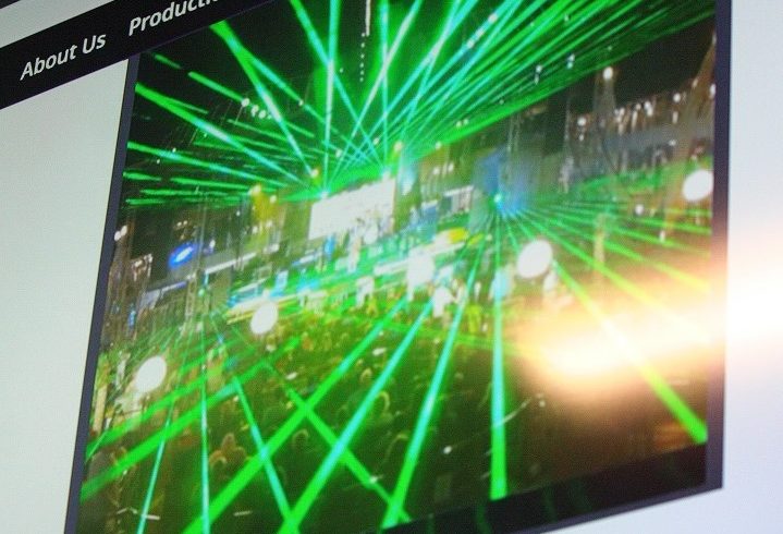 This slide shows a colorful laser display at a LaserNet performance. The slide was shown at the Williston City Council meeting.