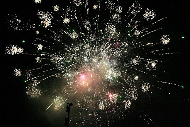 A large fireworks blast lights up the night at Horseman's Park as part of the finale.