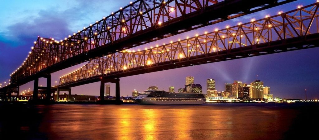 Internet photo by Hilton: The Hilton New Orleans Riverside uses this night photograph of the Mississippi River and a bridge to advertise the beauty and handy location of the hotel. It says the downtown hotel is within walking distance of the city's major attractions. Hilton