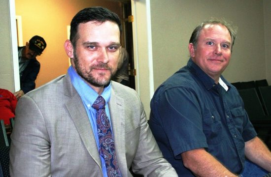 File Photo by Terry Witt: Williston Attorney Blake Fugate sits with his client, former Councilman Berlon Weeks, at a Bronson Town Council meeting in November of 2020. Fugate argued at the meeting that Weeks never resigned and should be restored to his position. The town council refused to honor the request.