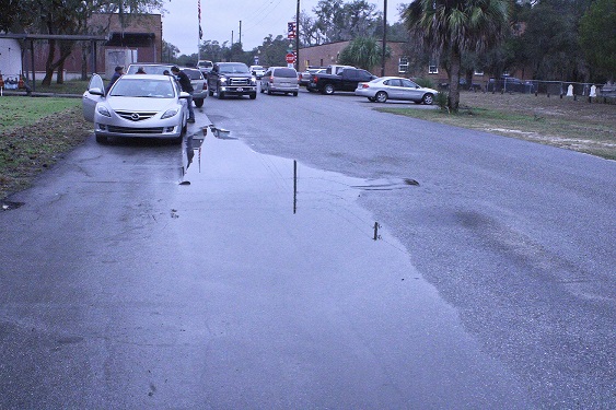 This large puddle in front of the Levy County Government Center entrance was three times this size when Tuesday's Levy County Commission meeting began.