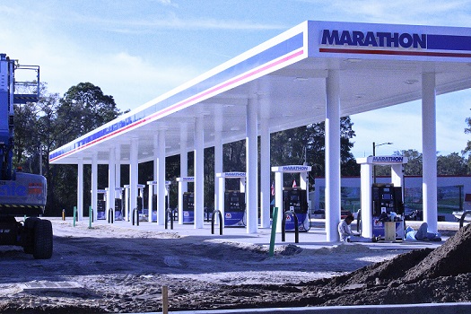 This bank of gas pumps looks out toward the intersection of U.S. 27A and State Road 24.