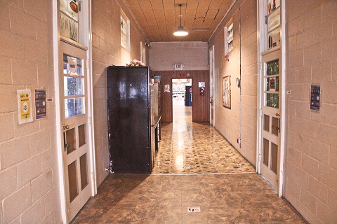 The main hallway of the old school building harkens back to a different era.