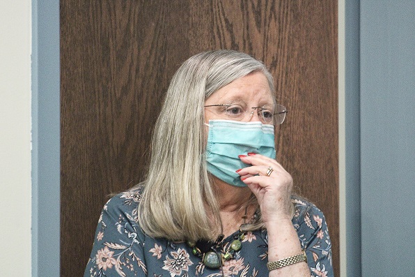 Council President Debra Jones emerges from isolation in an adjoining room to challenge the mayor's assertion that there was no quorum.