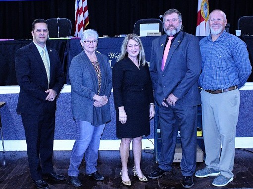 The Levy County Commission is pictured with its newest member, Desiree Mills. From the left, Commissioners Matt Brooks, Lilly Rooks, Desiree Mills, John Meeks, and Chairman Rock Meeks.