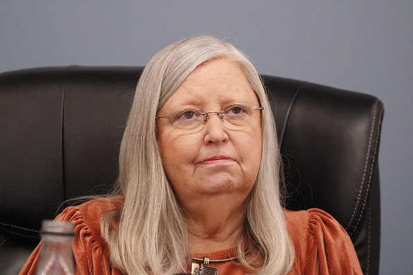 Council President Debra Jones makes no comment as she listens to Marguerite Robinson make her statement about the Mayor's use of a city credit card.