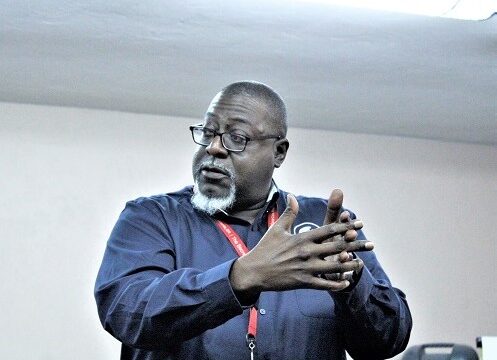 Leroy Marshal, chief professional engineer for the Suwannee River Water Management District, speaks in the workshop meeting in Bronson on May 23.