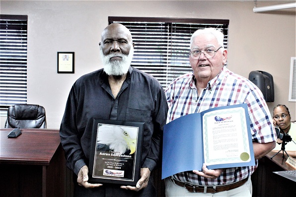 Councilman Aaron Edmondson is honored for his service with a proclamation from Mayor Robert Partin.