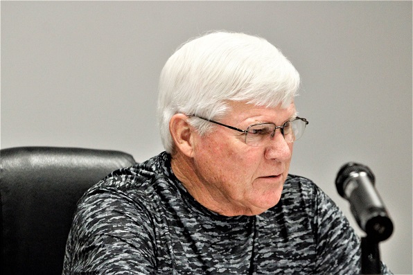 Commissioner Norman Weaver is advocating for longer commissioner terms of office.