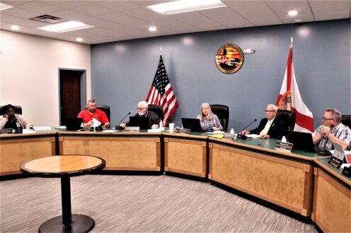 Williston City Council members debated an increase in electric bills but finally relented and gave preliminary approval on advice from financial counsel. From the left are Council members Darfeness Hinds, Zach Bullock, Mayor Charles Goodman, Council President Debra Jones, Council and members Jerry Robinson, and Michael Cox.