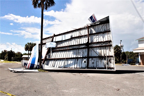 The gas pump canopy at the Marathon gas station and Jiffy Store in Cedar Key apparently got caught in a strong gust of wind. It was wrapped around the gas pumps.