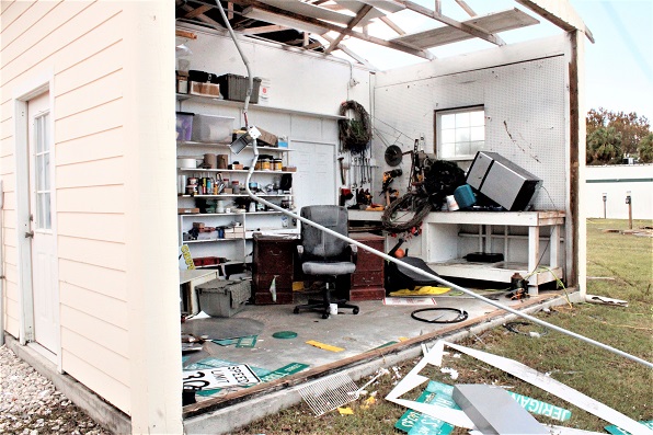 Hurricane Idalia ripped the front wall off this office next door to Cedar Key Fire Rescue.