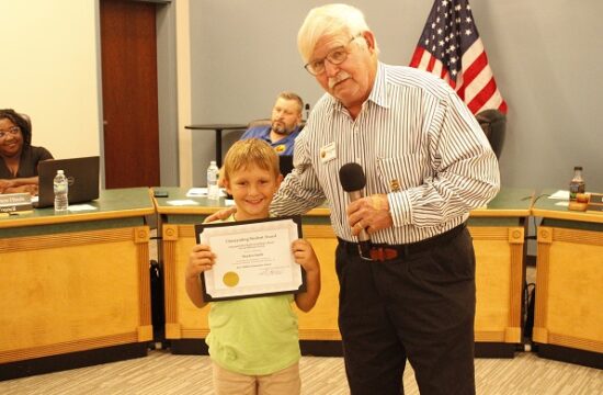 Student of the Month Hayden Smith received his certificate from Williston Mayor Charles Goodman.