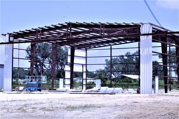 This is one of the private hangars under construction at the airport. The owner leases land for the hangar.